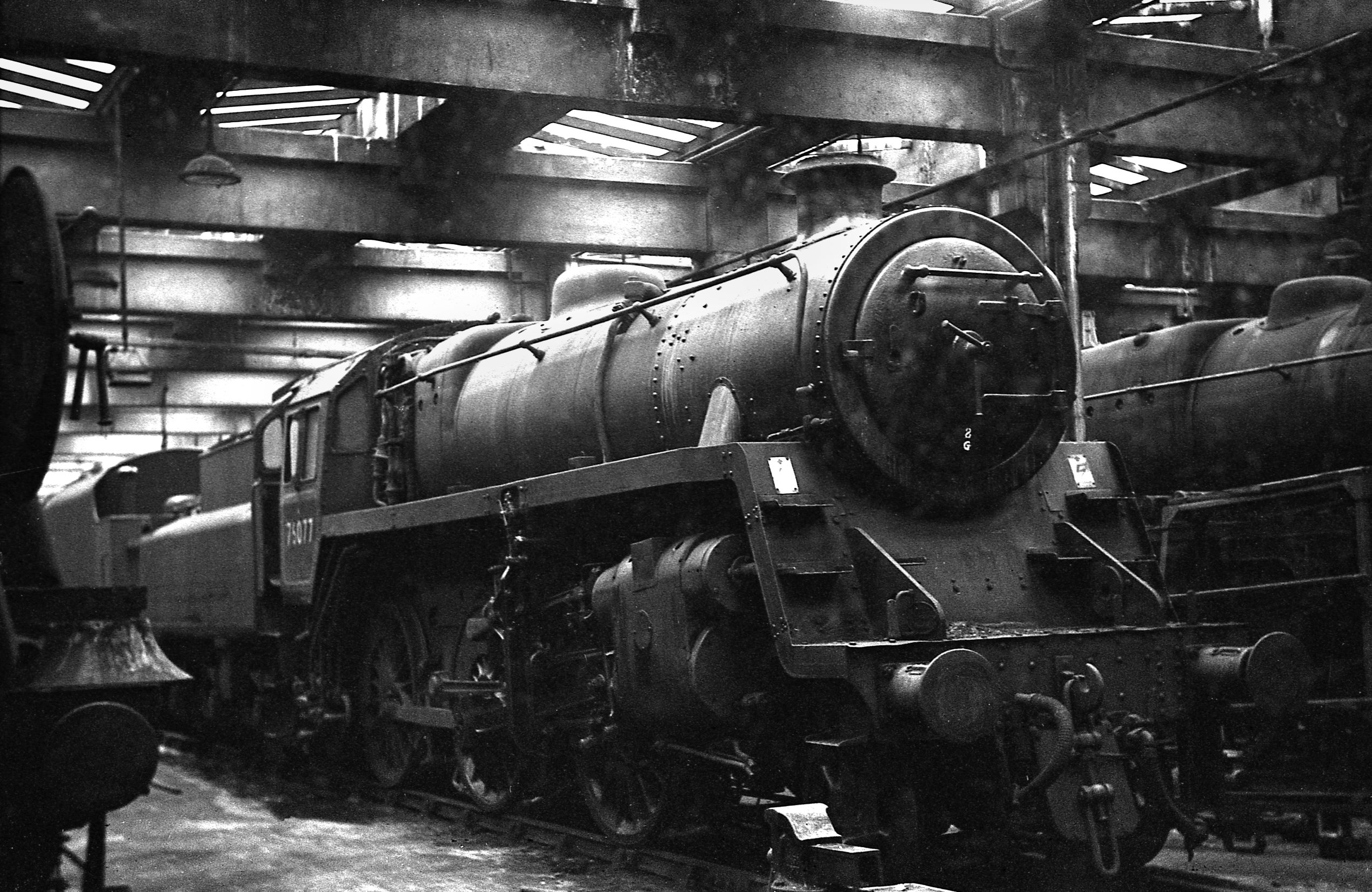 76077 resting inside Springs Branch shed in 28 August 1967 surrounded by Staniers